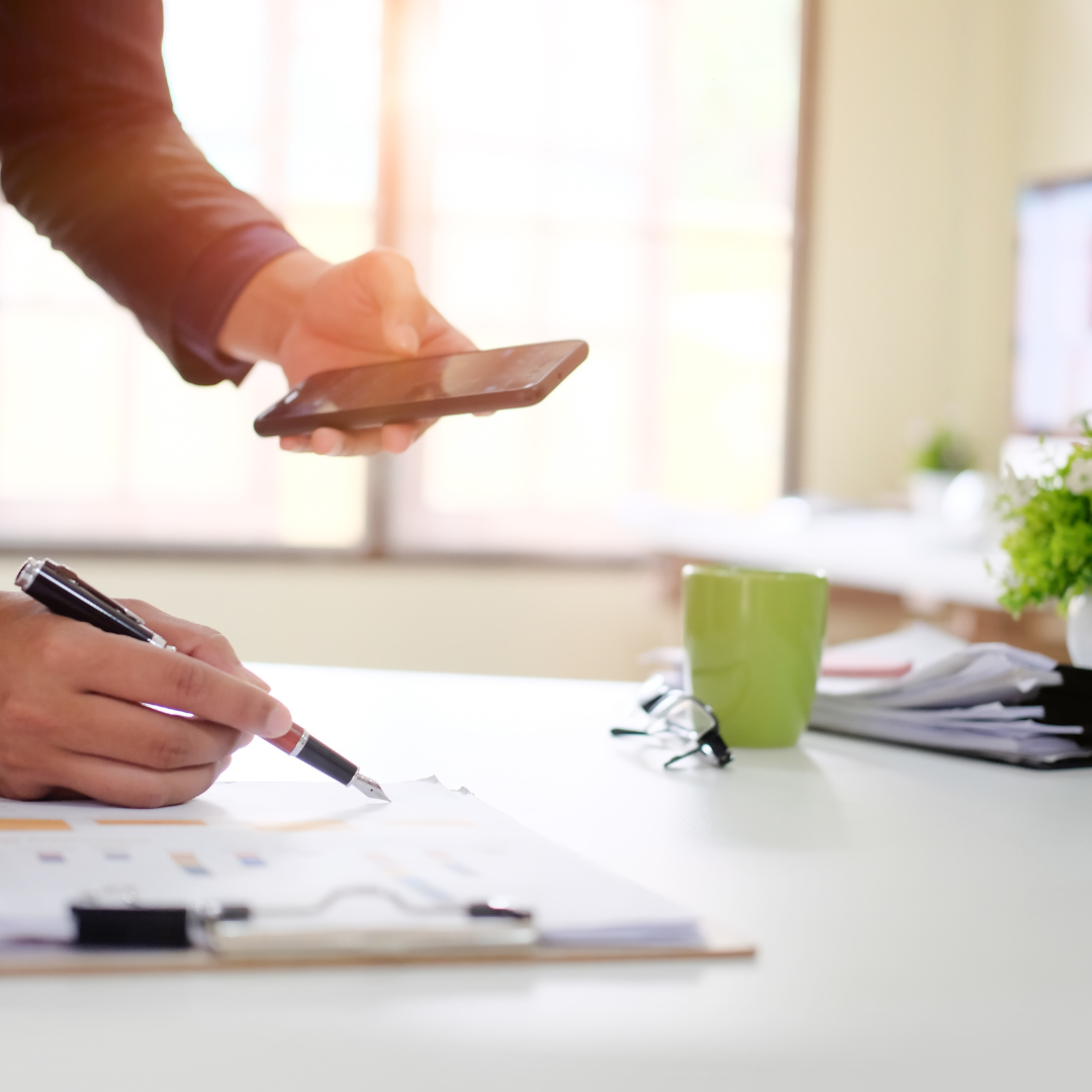 Man going through an implementation checklist